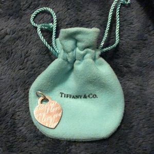 Tiffany’s “I love you” heart charm